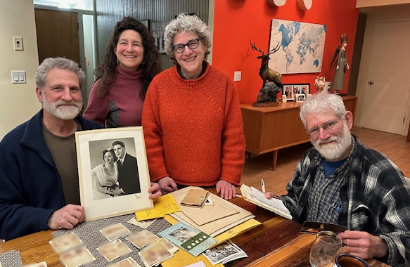 The four Gaal siblings with photo of parents